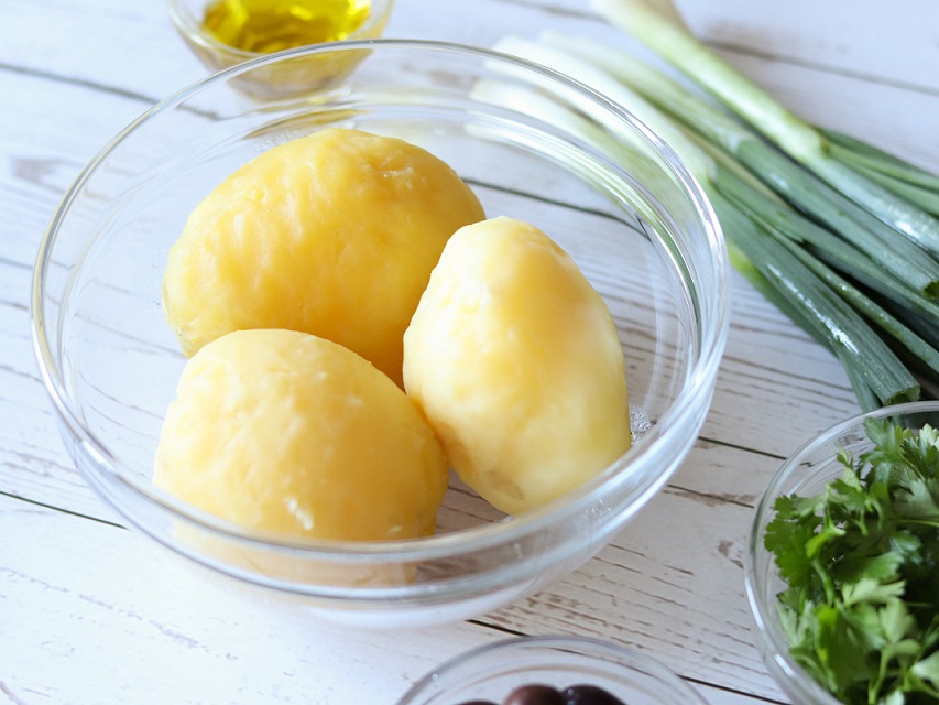 Boiled potatoes with vegetables to prepare healthy salad