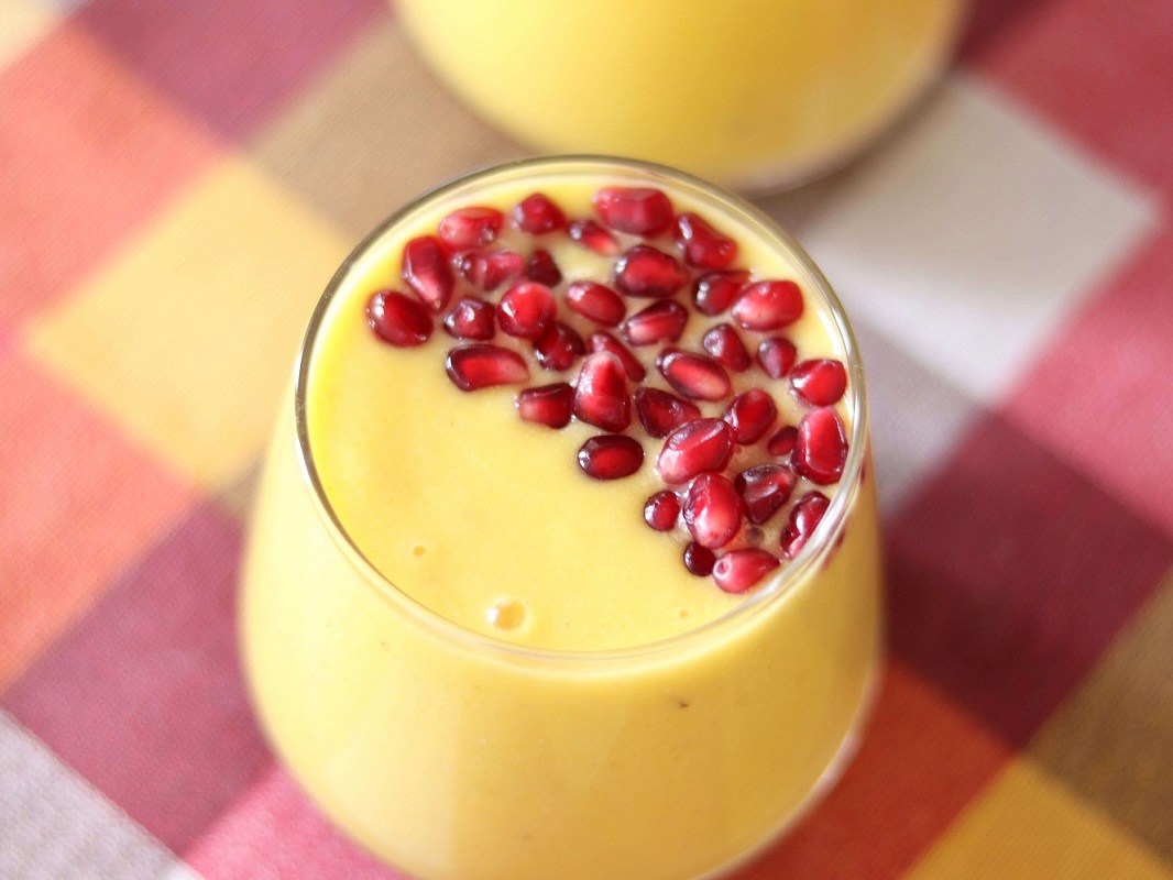 Tropical pineapple banana turmeric smoothie for breakfast or healthy snack
