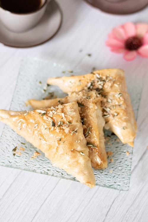 Sweet treats in a plate with a cup of coffee and pink flower. Easy make-ahead dessert.