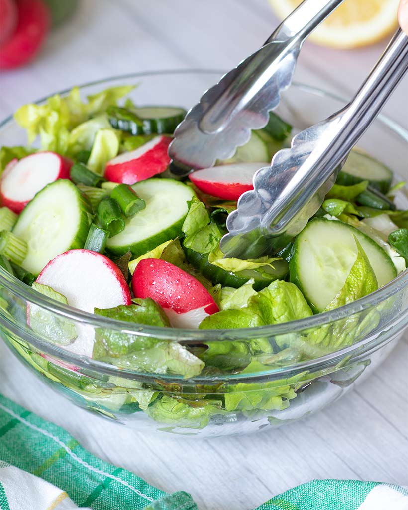 Light salad with butter lettuce and other green veggies. Low calorie recipe idea.