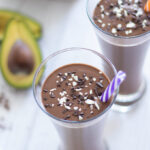 Chocolate avocado banana smoothie with organic cocoa powder for healthy breakfast, snack, dessert.