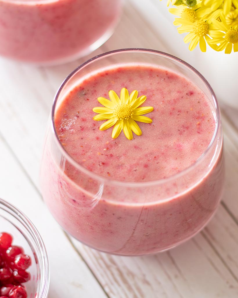 Vibrant flavorful nutritious pink cranberry beverage for post-workout snack