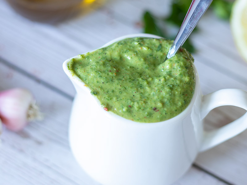 Raw, fresh, delicious avocado parsley dip for pasta.