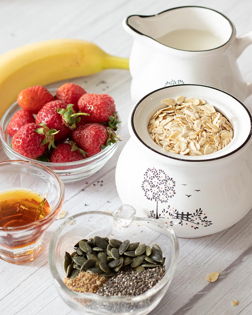 Wholesome ingredients for quick oatmeal with strawberries