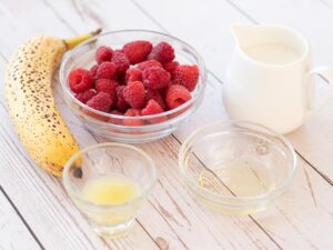 Simple, wholesome ingredients for a healthy vegan raspberry smoothie recipe/