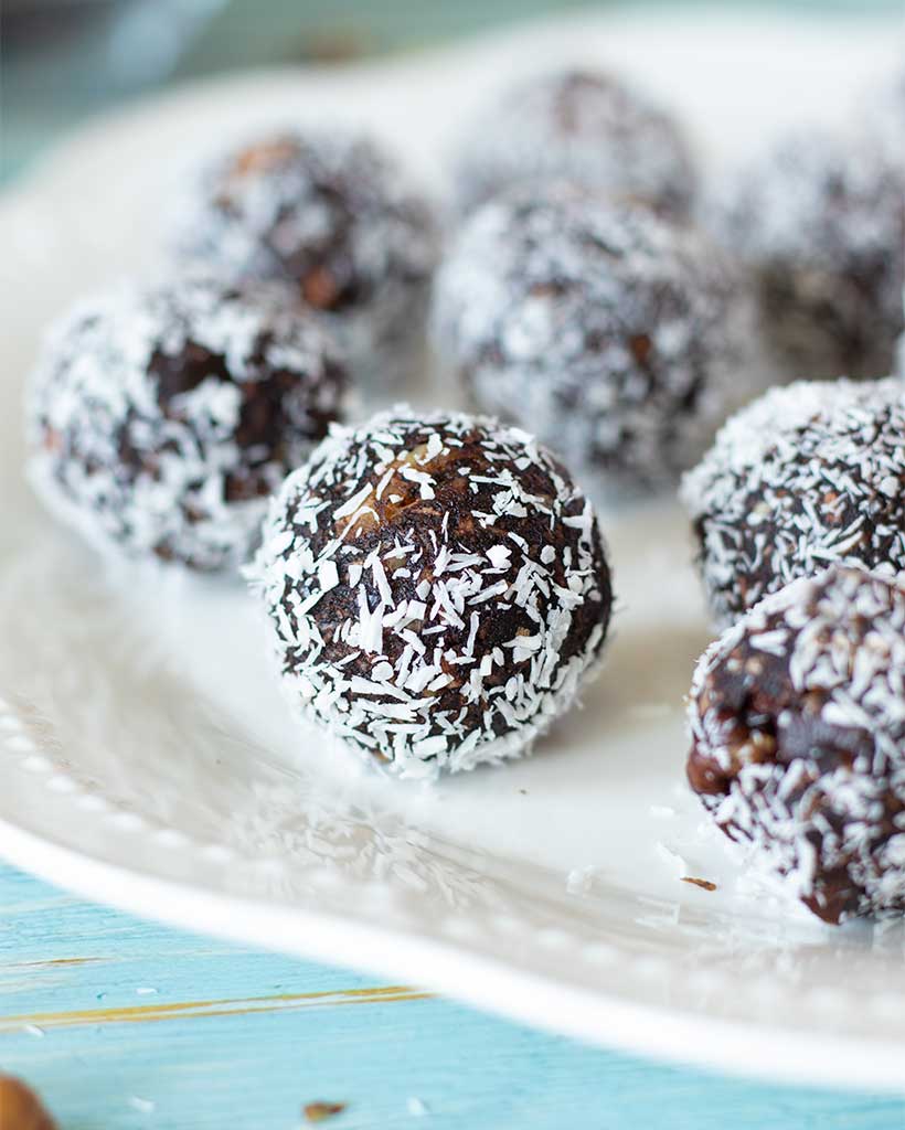 Vegan chocolate coconut balls with dates