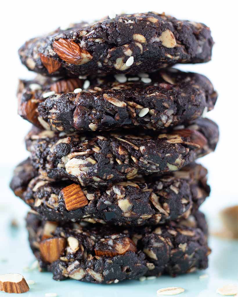 A stack of oat tahini date cookies without eggs, sugar or dairy milk