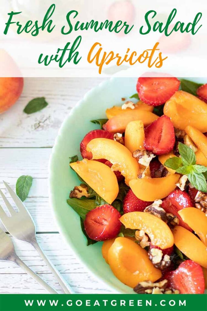 Fresh salad with apricots and strawberries