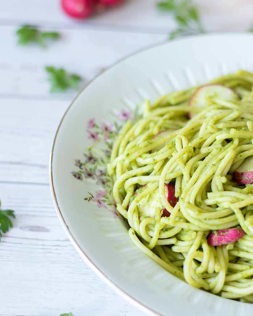 Green vegan spaghetti recipe for family gatherings, potlucks, dinner, or lunch or busy days.