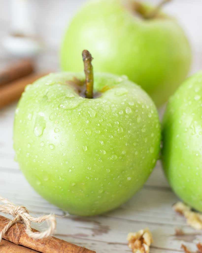 Close up of green apples for baking simple fall cake dessert.