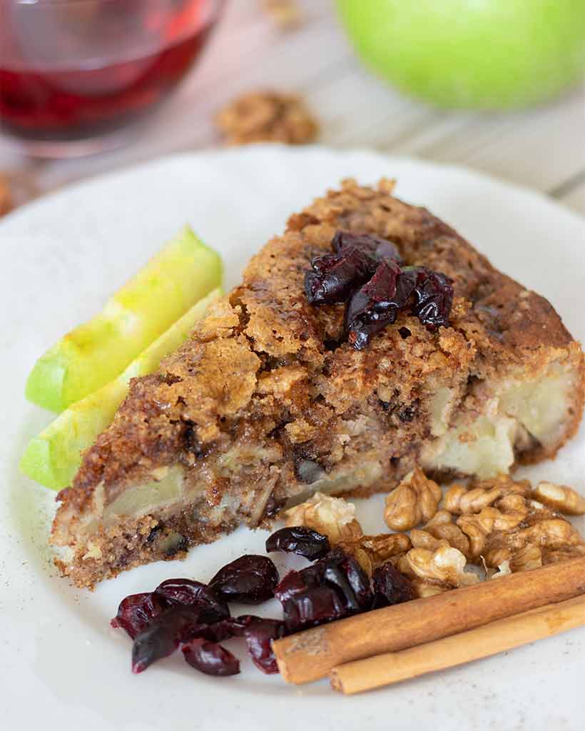 Easy and healthy vegan apple cake with cinnamon and walnuts. Delicious fall dessert recipe.