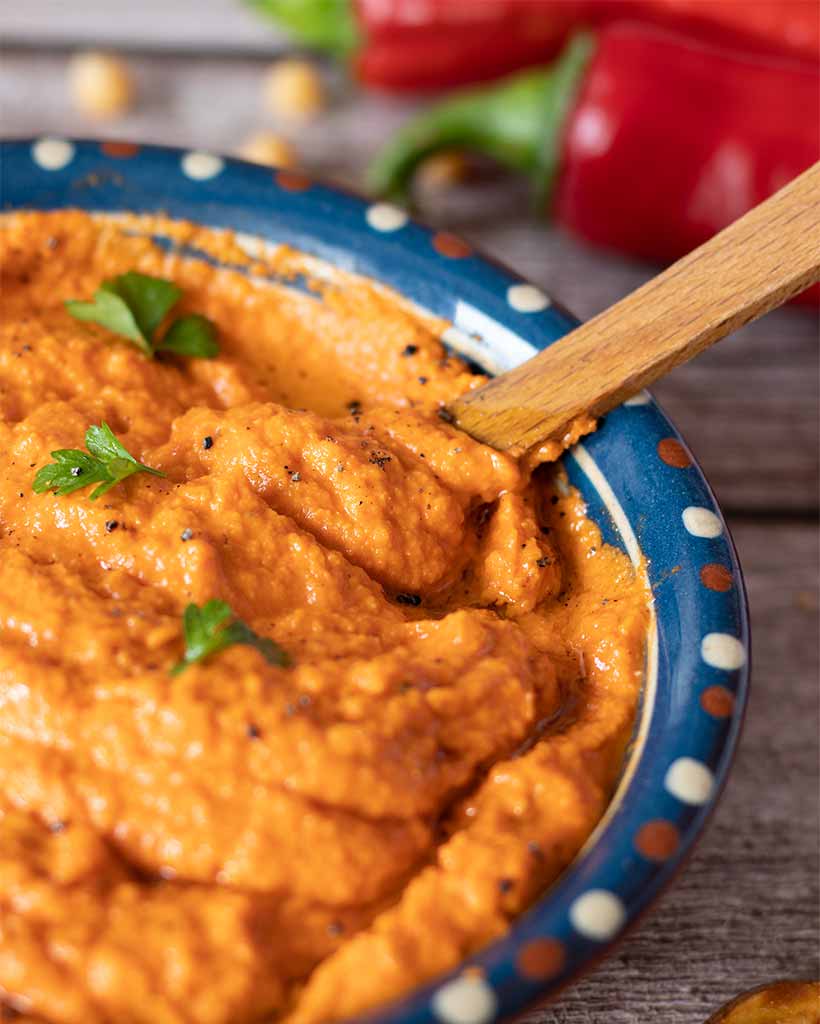 Best recipe for roasted red pepper hummus with tahini and chickpeas. Light and filling easy vegan meal prep idea.