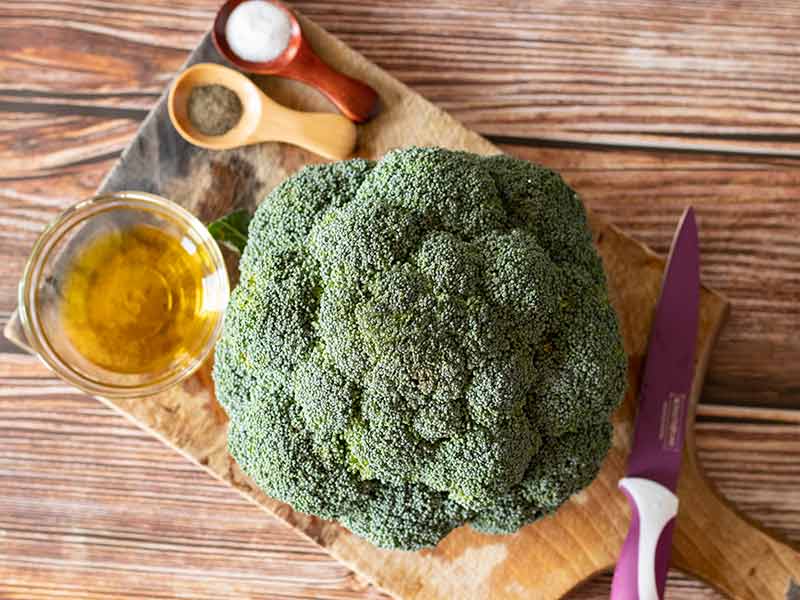 Simple, plant-based and budget-friendly ingredients for cooking roasted broccoli recipe in the oven: fresh broccoli, olive oil, salt and black pepper.