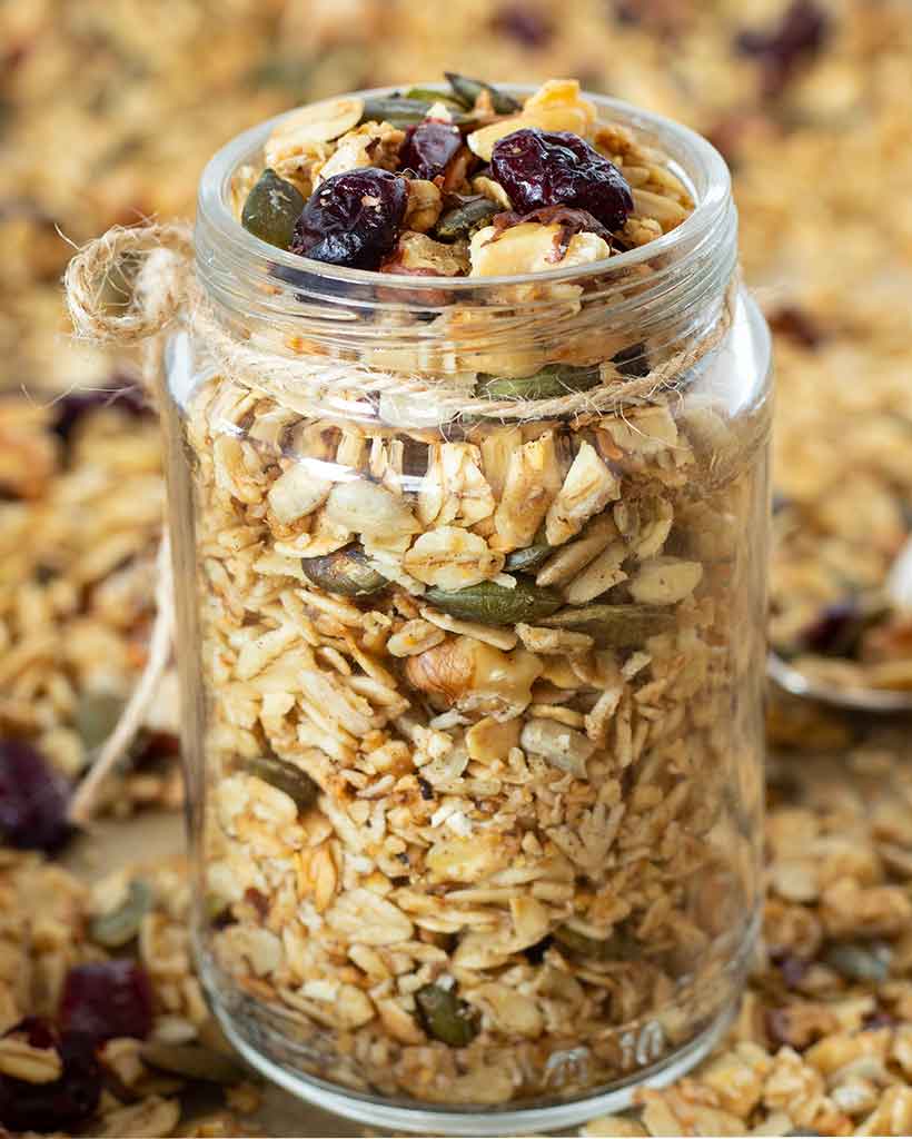 Vegan gluten-free granola in a glass jar.