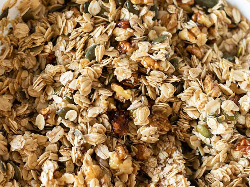 Homemade granola mixture in a bowl.