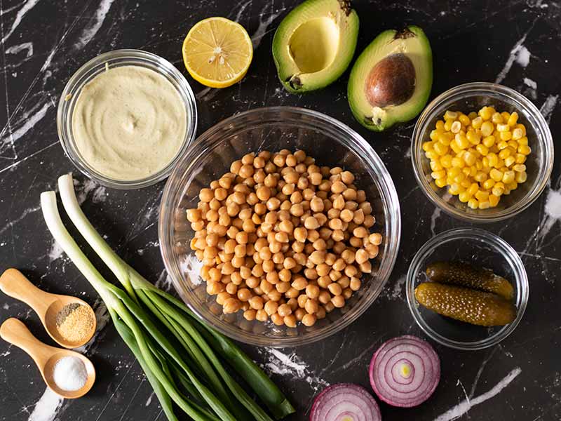 Wholesome, simple, and cheap plant-based ingredients for making homemade meatless vegan chickpea tuna salad recipe.