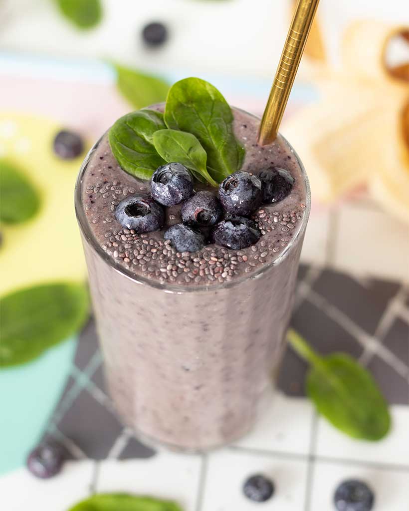 Smooth and creamy vegan blueberry smoothie with spinach with creamy texture for nourishing weight-loss breakfast or snack.