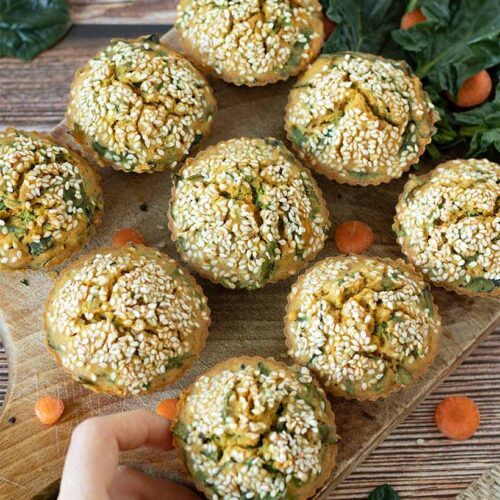 Savoury healthy vegan spinach muffins with carrots and corn flour for breakfast, brunch, or snack