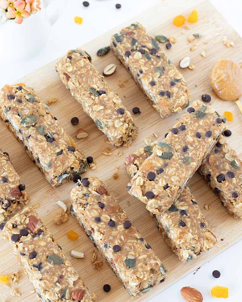 Gluten-free and refined sugar-free granola bars on wooden board