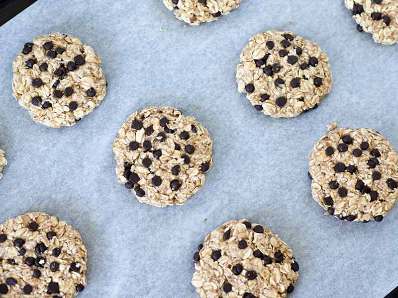 Vegan banana oatmeal cookies on baking sheet.