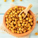 Crispy, salty, and spicy homemade vegan snacks - oven roasted chickpeas.
