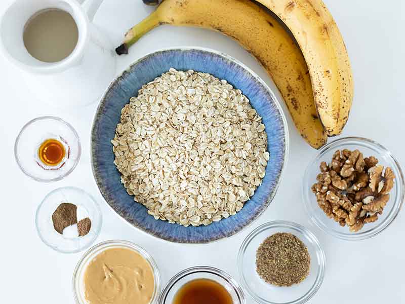 Simple plant-based ingredients for vegan banana bake without sugar or eggs.
