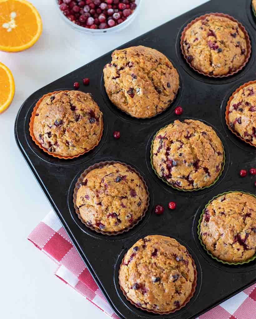 Delicious dairy-free cranberry muffins made with fresh orange juice for breakfast, dessert or snack