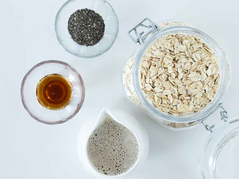 Healthy plant-based ingredients for preparing easy low-calorie breakfast with oats