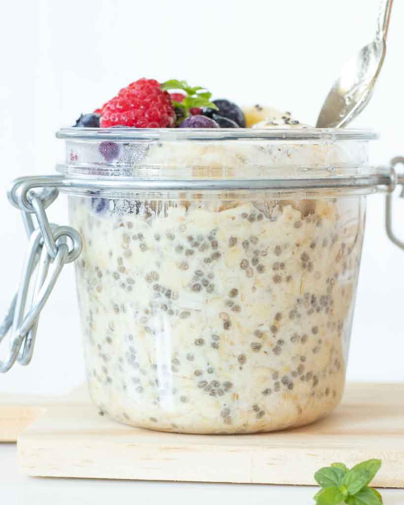 Weightloss overnight oats on a wooden board as an easy and healthy make ahead breakfast