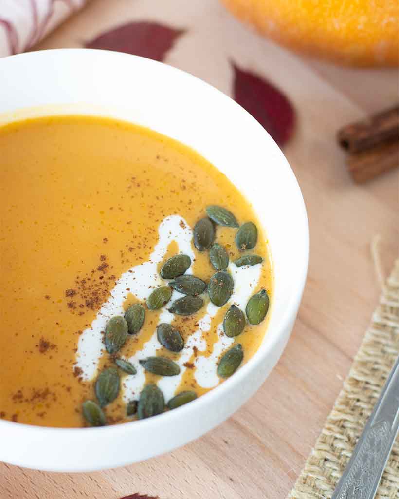 Healthy fall soup made with butternut squash and vegetables as an easy Thanksgiving side, starter, appetizer, or dinner.