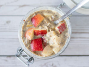 Overnight oatmeal with apples, peanut butter, oats, chia seeds and other wholesome ingredients as a simple make-ahead breakfast