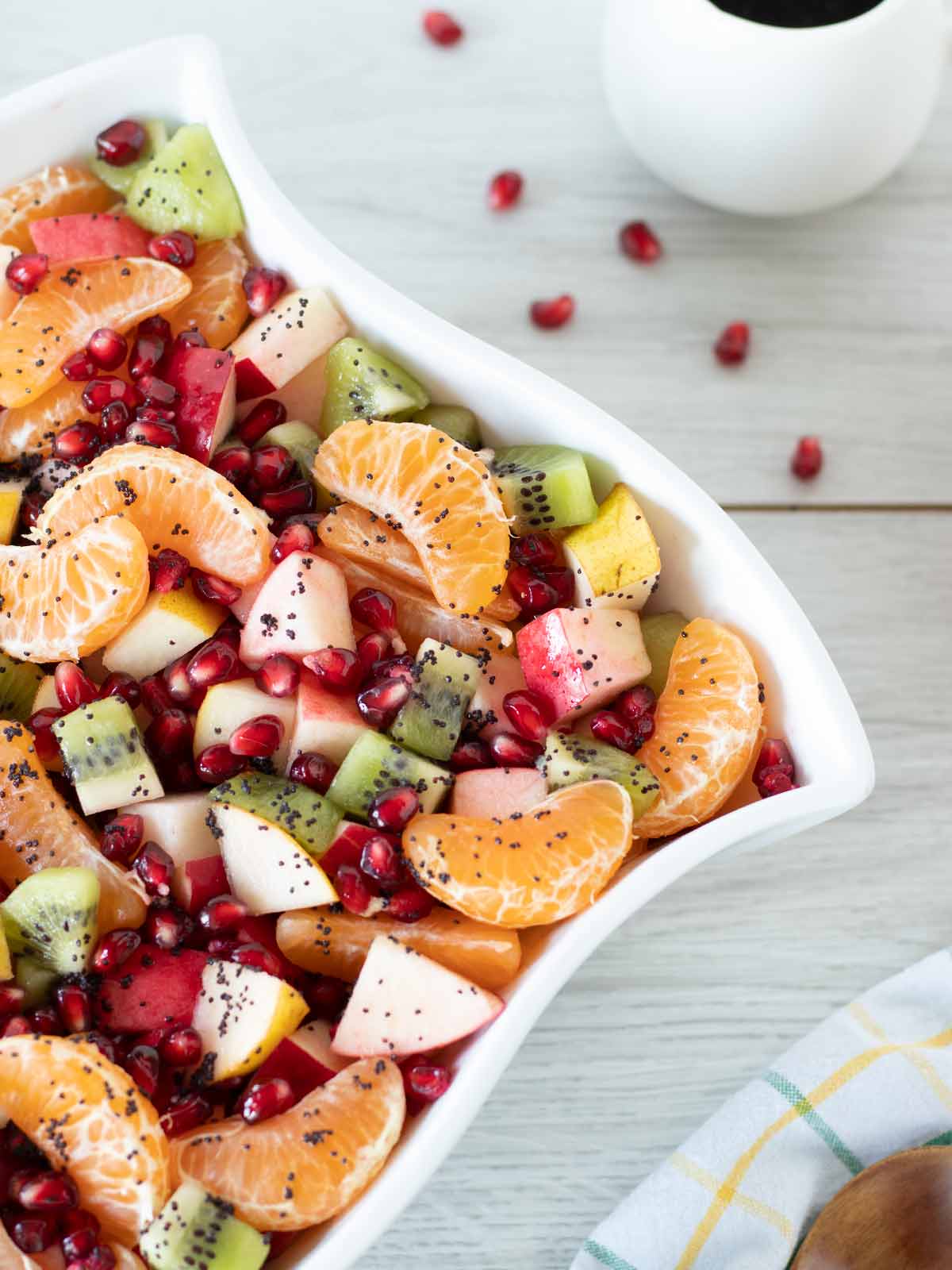 Healthy colorful winter fruit salad in a big bowl for Thanksgiving side dish or easy brunch