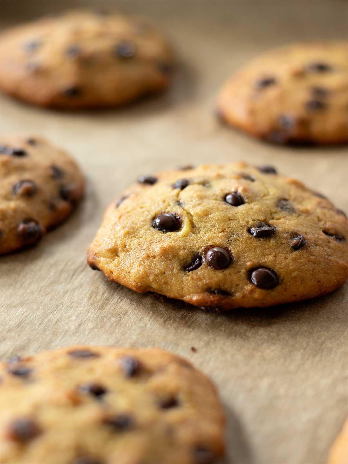 Baked chickpea cookies on a baking sheet lined with parchment paper