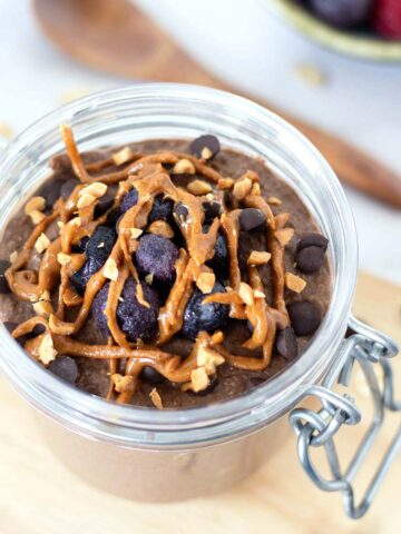 Chocolate peanut butter blended overnight oats in a jar for breakfast meal prep