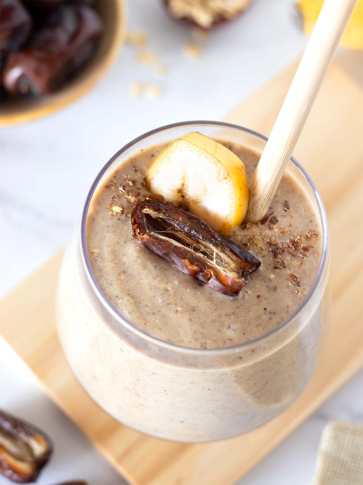 Banana date smoothie with oats and peanut butter.