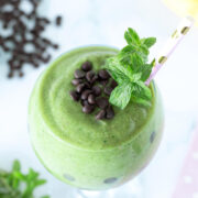 Green mint chocolate chip smoothie with banana, avocado, and spinach.