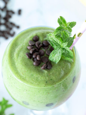 Green mint chocolate chip smoothie with banana, avocado, and spinach.