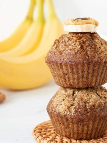 Moist banana muffins with 2 bananas, cinnamon, oil, and brown sugar.