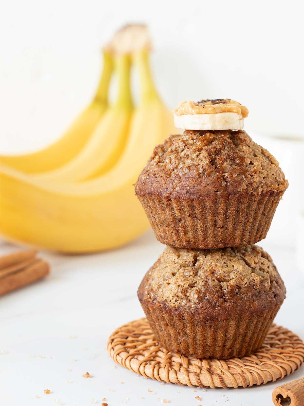 Moist banana muffins with 2 bananas, cinnamon, oil, and brown sugar.