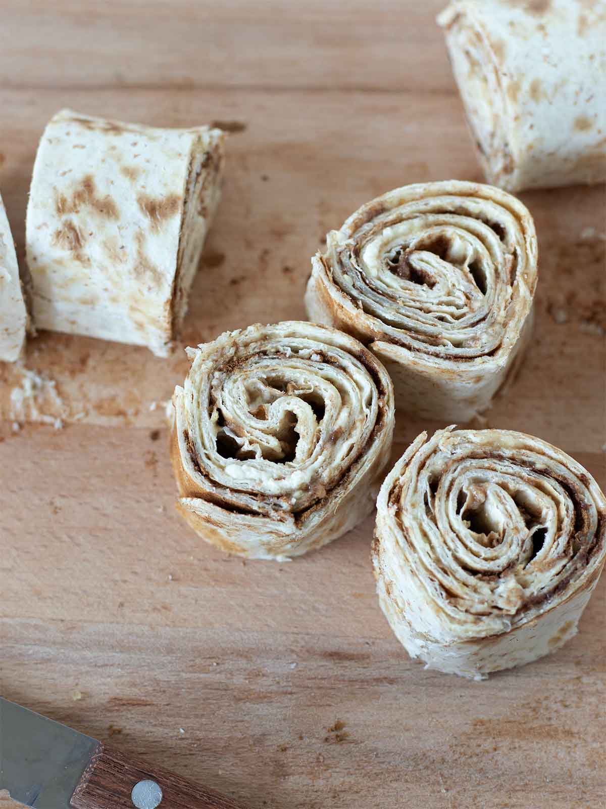 Cinnamon tortilla roll ups with cream cheese and brown sugar.