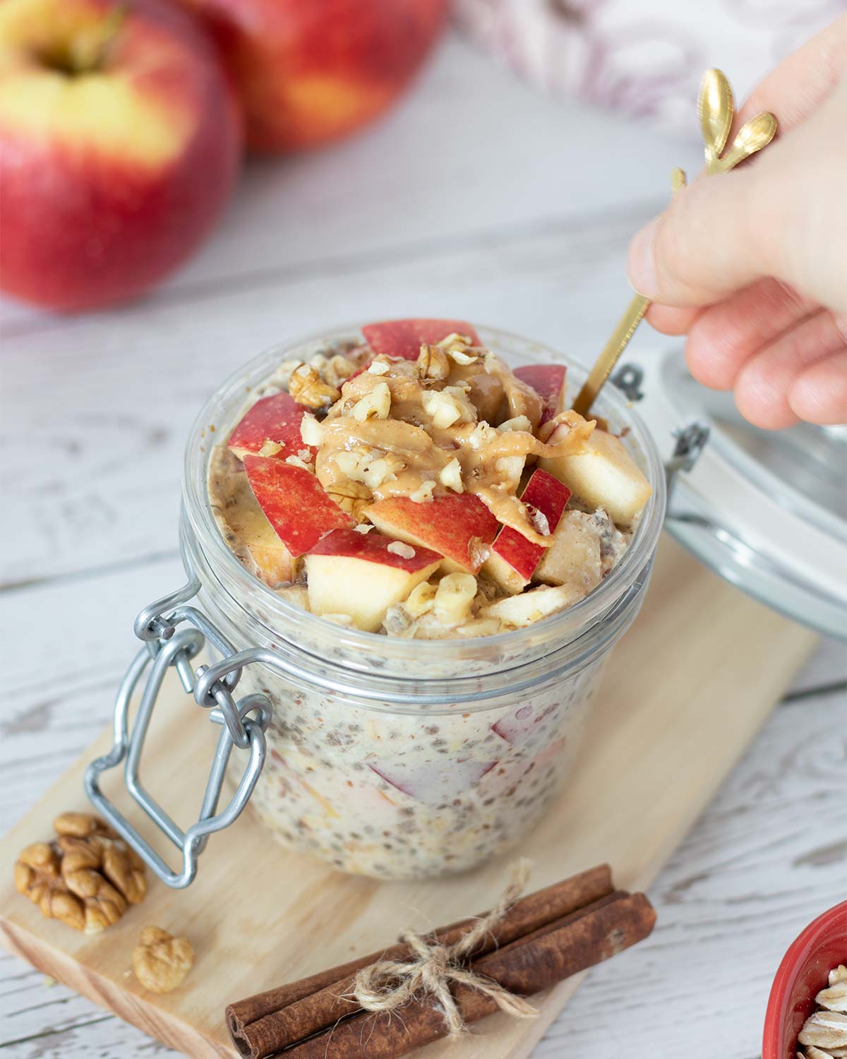 Peanut butter apple cinnamon overnight oats without yogurt in a jar.