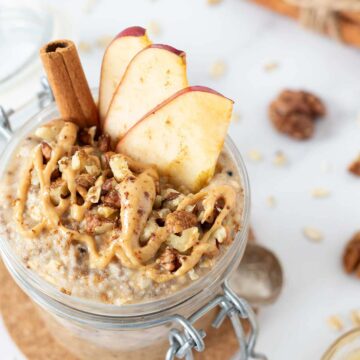 Applesauce overnight oats with cinnamon, peanut butter, and chia seeds for breakfast.