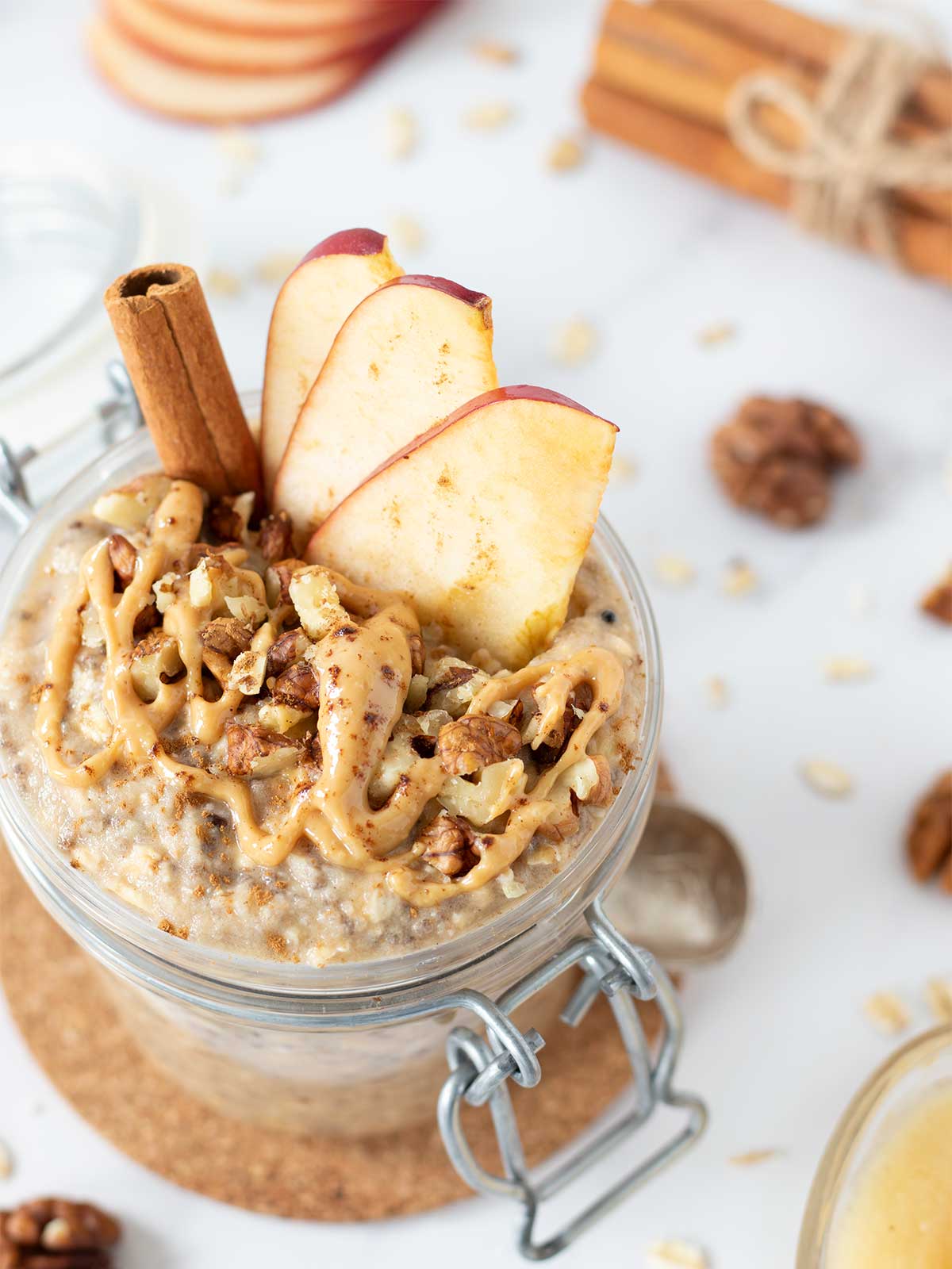 Applesauce overnight oats with cinnamon, peanut butter, and chia seeds for breakfast.