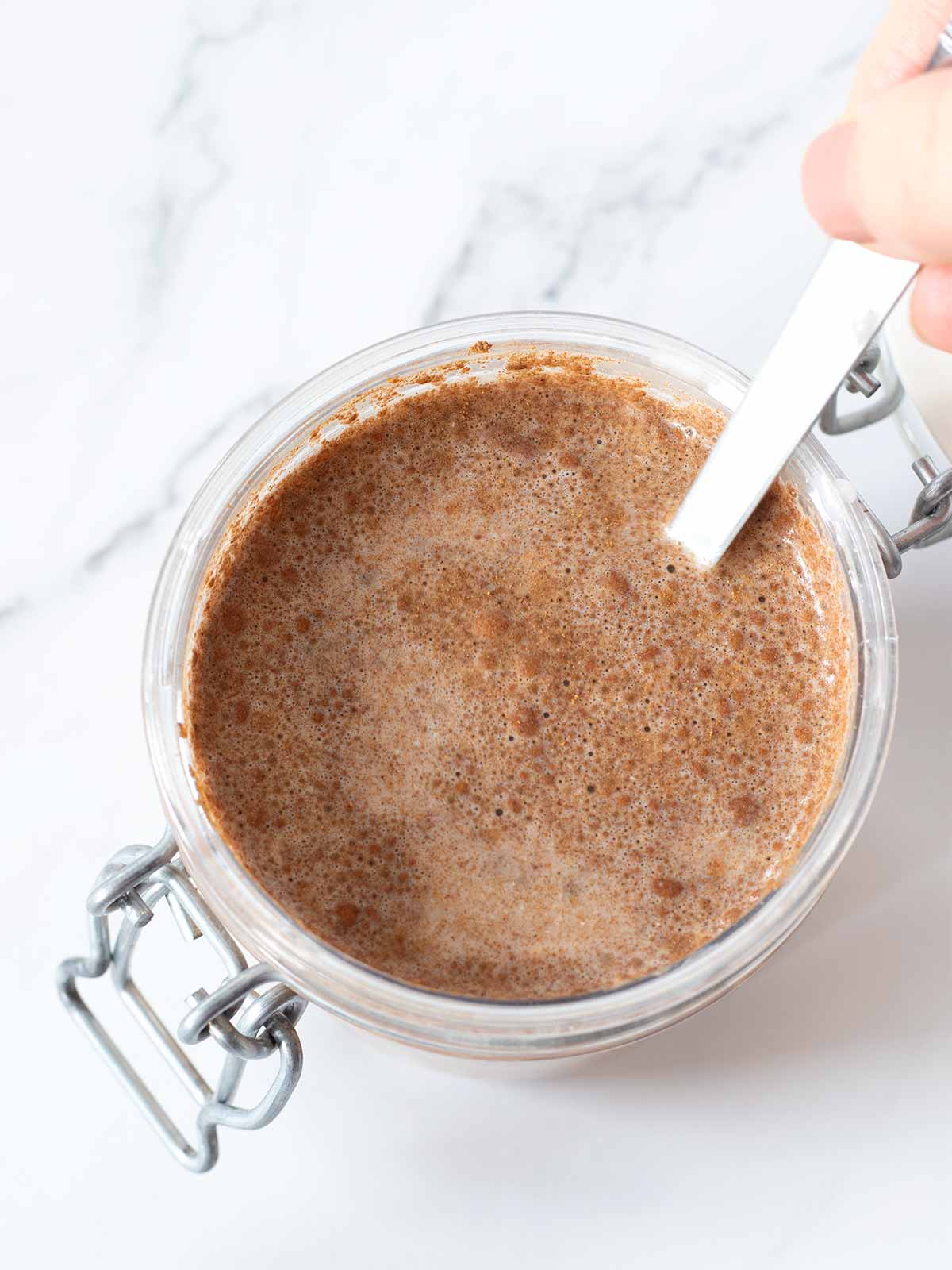 Cinnamon brown sugar cold oatmeal in a jar.