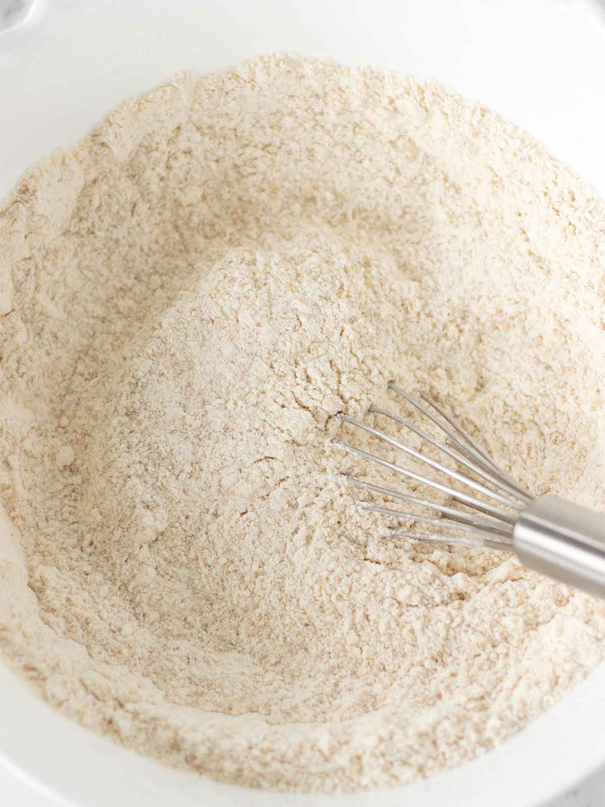 Dry ingredients for muffins in a bowl.