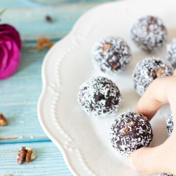 Chocolate walnut date balls with coconut.