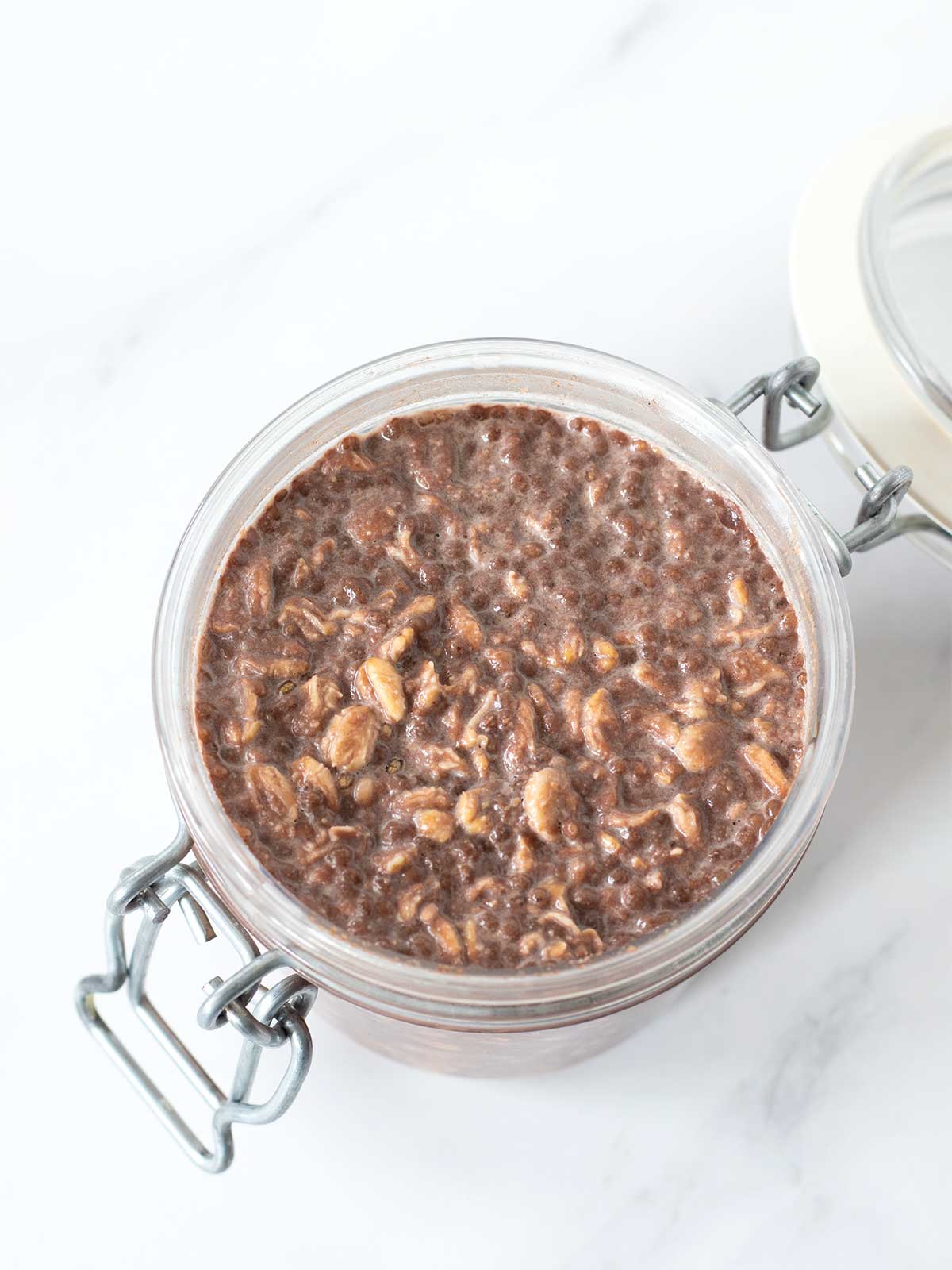 Chilled Nutella overnight oats in a jar.