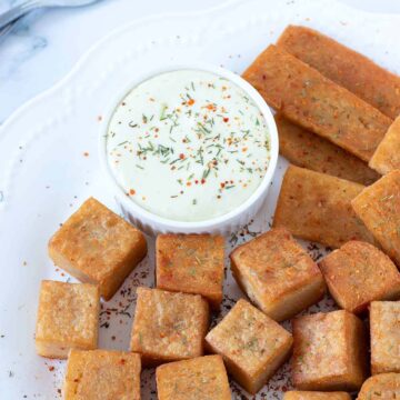 Red lentil tofu (soy-free) cubed, sliced, and fried until golden brown.