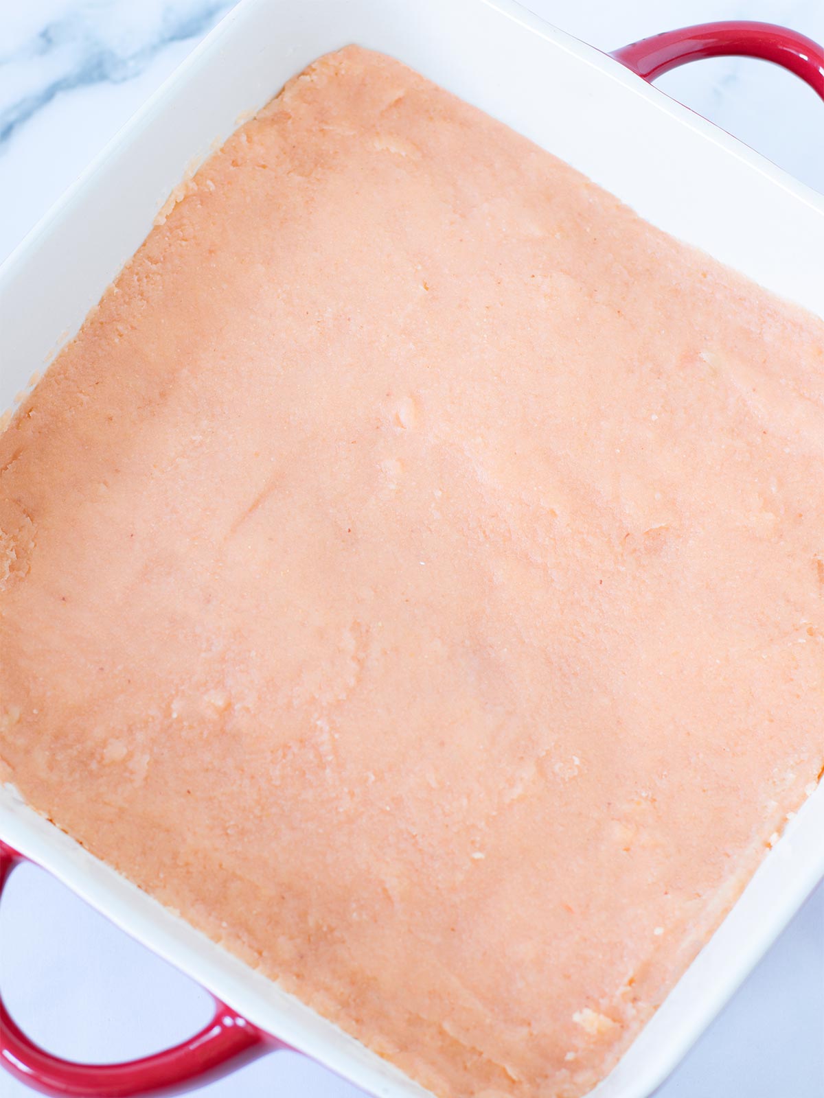 Homemade non-soy tofu mixture in a baking dish.