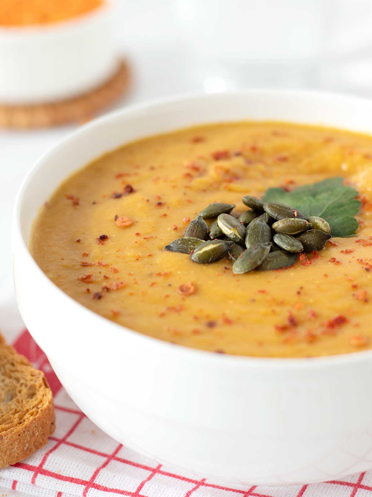 Red lentil carrot soup with tomato.